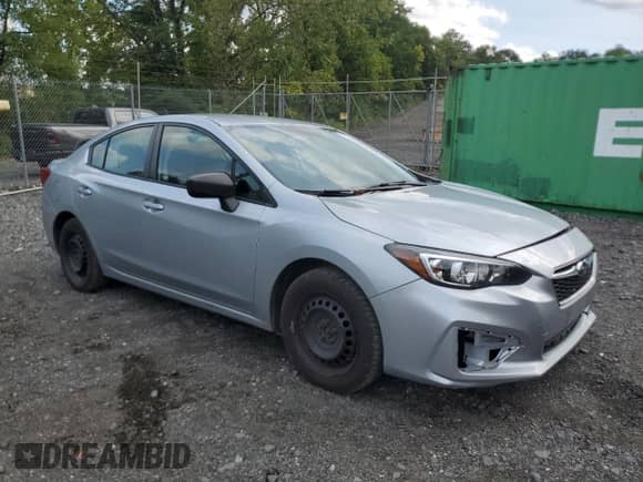 2018 Subaru Impreza with VIN 4S3GKAA6XJ3616483, listed as a Copart auction lot 71412755 with 211,272 mi miles and Salvage title. Bid and sale history available at DreamBid. Image 4.