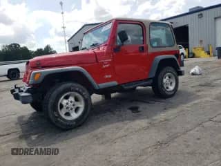 2000 Jeep Wrangler Sport with VIN 1J4FA49S6YP783339, listed as a Copart auction lot 68548335 with 45,484 mi miles and Salvage title. Bid and sale history available at DreamBid. Image 1.