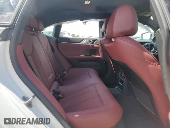2024 BMW i4 eDrive35 with VIN WBY43AW03RFR59830, listed as a Copart auction lot 70283535 with 23,026 mi miles and Salvage title. Bid and sale history available at DreamBid. Image 10.