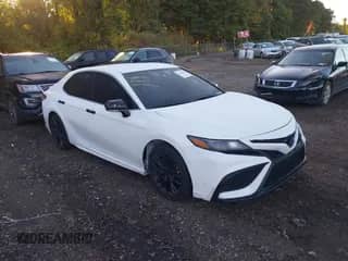 2024 Toyota Camry SE with VIN 4T1G11BK9RU129310, listed as a IAAI auction lot 43412844 with 40,683 mi miles and . Bid and sale history available at DreamBid. Image 1.