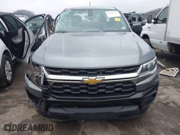 2021 Chevrolet Colorado 4WD Work Truck z VIN 1GCGTBEN9M1296691, wystawiony jako IAAI lot #41460241 z przebiegiem 55 952 mil mil oraz . Historia ofert i sprzedaży dostępna na DreamBid. Obrazek 13.