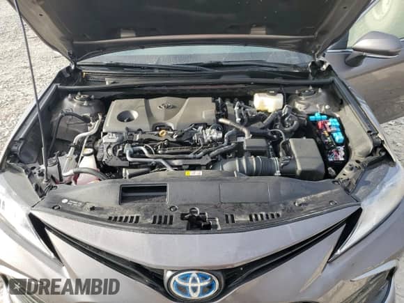 2024 Toyota Camry Hybrid LE z VIN 4T1H31AK4RU077097, wystawiony jako Copart lot #69647975 z przebiegiem 8 582 mil mil oraz Czysty tytuł • Clean title. Historia ofert i sprzedaży dostępna na DreamBid. Obrazek 11.