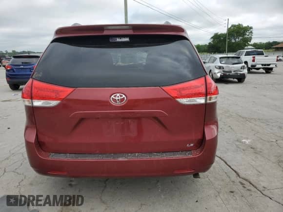 2014 Toyota Sienna LE AAS with VIN 5TDKK3DC1ES448857, listed as a Copart auction lot 61847415 with 186,586 mi miles and Salvage title. Bid and sale history available at DreamBid. Image 6.