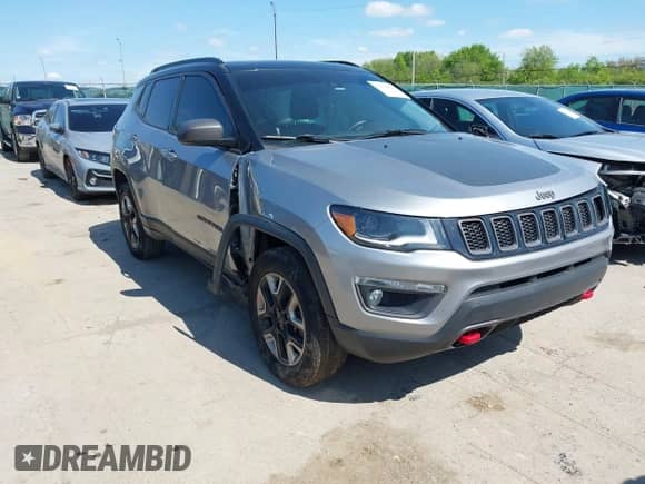 2018 Jeep Compass Trailhawk z VIN 3C4NJDDB9JT272864, wystawiony jako IAAI lot #42284940 z przebiegiem Nie podano mil oraz . Historia ofert i sprzedaży dostępna na DreamBid. Obrazek 1.