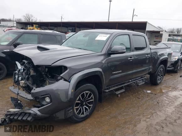 2022 Toyota Tacoma SR5 z VIN 3TYDZ5BN1NT017041, wystawiony jako IAAI lot #41475501 z przebiegiem 39 460 mil mil oraz . Historia ofert i sprzedaży dostępna na DreamBid. Obrazek 18.
