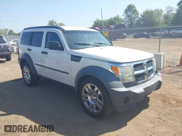 2008 Dodge Nitro SXT with VIN 1D8GU28K98W145150, listed as a IAAI auction lot 43200456 with 153,841 mi miles and . Bid and sale history available at DreamBid. Image 1.