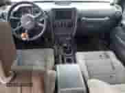 2007 Jeep Wrangler Unlimited Rubicon with VIN 1J4GA69117L112867, listed as a Copart auction lot 59909565 with 166,963 mi miles and Salvage title. Bid and sale history available at DreamBid. Image 8.