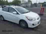 2014 Hyundai Accent GLS z VIN KMHCT4AE8EU612349, wystawiony jako IAAI lot #43336595 z przebiegiem 123 884 mil mil oraz . Historia ofert i sprzedaży dostępna na DreamBid. Obrazek 1.