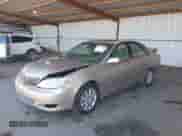 2002 Toyota Camry LE z VIN JTDBE32K320136619, wystawiony jako IAAI lot #42821050 z przebiegiem 165 174 mil mil oraz . Historia ofert i sprzedaży dostępna na DreamBid. Obrazek 2.