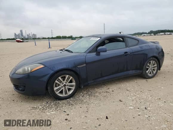 2008 Hyundai Tiburon GS с VIN KMHHM66D28U284008, выставлен на аукционе Copart как лот 55500035 с пробегом 108 084 миль миль и Списание • Salvage title. История ставок и продаж доступна на DreamBid. Изображение 1.