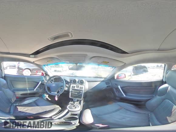 2005 Hyundai Tiburon GT с VIN KMHHN65F85U182644, выставлен на аукционе Copart как лот 63826104 с пробегом 100 245 миль миль и Списание • Salvage title. История ставок и продаж доступна на DreamBid. Изображение 12.