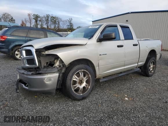 2010 Dodge 1500 SLT with VIN 1D7RV1GP4AS240472, listed as a Copart auction lot 79394904 with 174,803 mi miles and Salvage title. Bid and sale history available at DreamBid. Image 1.