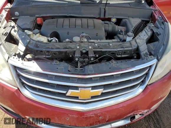 2013 Chevrolet Traverse LT z VIN 1GNKRGKD1DJ242472, wystawiony jako Copart lot #68305235 z przebiegiem 161 980 mil mil oraz Szkoda całkowita • Salvage title. Historia ofert i sprzedaży dostępna na DreamBid. Obrazek 12.