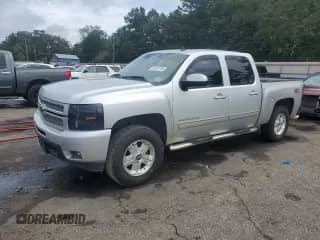2012 Chevrolet Silverado 1500 LTZ with VIN 3GCPKTE73CG228817, listed as a Copart auction lot 81517735 with 215,317 mi miles and Salvage title. Bid and sale history available at DreamBid. Image 1.