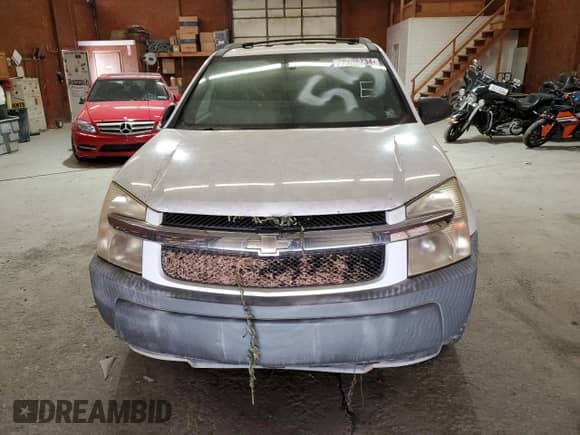 2005 Chevrolet Equinox LS z VIN 2CNDL23F956110642, wystawiony jako Copart lot #69178734 z przebiegiem Nie podano mil oraz Szkoda całkowita • Salvage title. Historia ofert i sprzedaży dostępna na DreamBid. Obrazek 5.