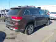 2014 Jeep Grand Cherokee Summit z VIN 1C4RJFJM2EC534132, wystawiony jako IAAI lot #42842349 z przebiegiem 96 636 mil mil oraz . Historia ofert i sprzedaży dostępna na DreamBid. Obrazek 4.