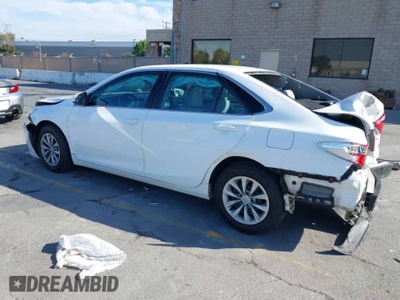 2015 Toyota Camry SE z VIN 4T1BF1FK8FU068002, wystawiony jako IAAI lot #43106714 z przebiegiem 102 717 mil mil oraz . Historia ofert i sprzedaży dostępna na DreamBid. Obrazek 3.