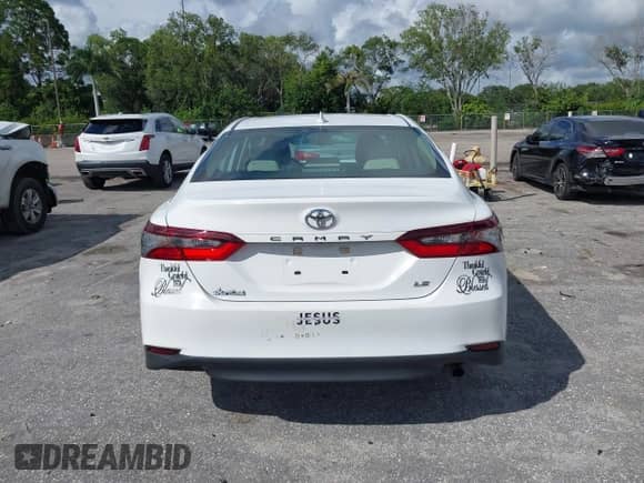 2021 Toyota Camry LE with VIN 4T1C11AK8MU601313, listed as a IAAI auction lot 43383218 with 34,384 mi miles and . Bid and sale history available at DreamBid. Image 16.