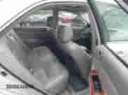 2002 Toyota Camry LE with VIN 4T1BE30K22U601060, listed as a IAAI auction lot 43443949 with 241,972 mi miles and . Bid and sale history available at DreamBid. Image 8.