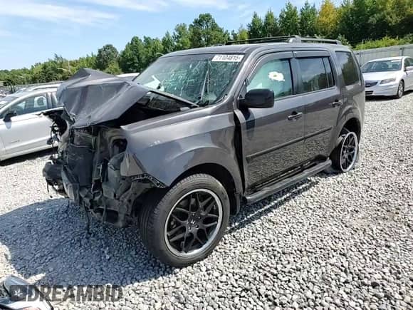 2013 Honda Pilot LX with VIN 5FNYF4H21DB083721, listed as a Copart auction lot 71104815 with 191,908 mi miles and Salvage title. Bid and sale history available at DreamBid. Image 14.