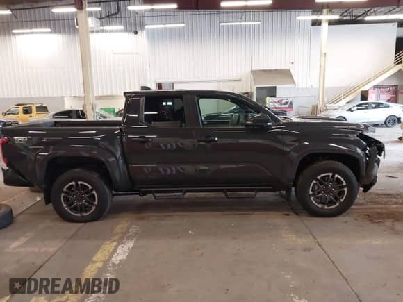 2024 Toyota Tacoma SR5 with VIN 3TMLB5JN9RM067351, listed as a IAAI auction lot 41529043 with 3,054 mi miles and . Bid and sale history available at DreamBid. Image 14.