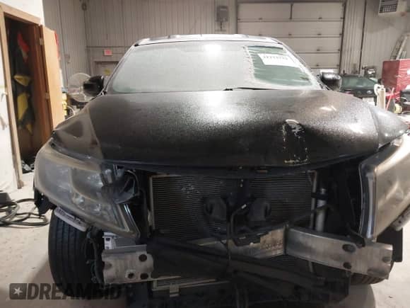 2014 Nissan Pathfinder SV with VIN 5N1AR2MMXEC693535, listed as a IAAI auction lot 41273732 with 149,962 mi miles and . Bid and sale history available at DreamBid. Image 13.