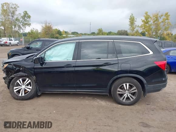 2018 Honda Pilot EX-L z VIN 5FNYF6H64JB057690, wystawiony jako IAAI lot #43287025 z przebiegiem 96 183 mil mil oraz . Historia ofert i sprzedaży dostępna na DreamBid. Obrazek 13.