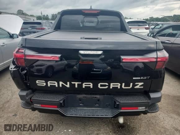 2023 Hyundai Santa Cruz Night Edition с VIN 5NTJCDAF7PH049040, выставлен на аукционе Copart как лот 64317285 с пробегом 35 030 миль миль и Списание • Salvage title. История ставок и продаж доступна на DreamBid. Изображение 6.