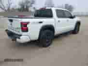 2023 Nissan Frontier SV z VIN 1N6ED1EK9PN615067, wystawiony jako IAAI lot #41554561 z przebiegiem 23 529 mil mil oraz . Historia ofert i sprzedaży dostępna na DreamBid. Obrazek 4.