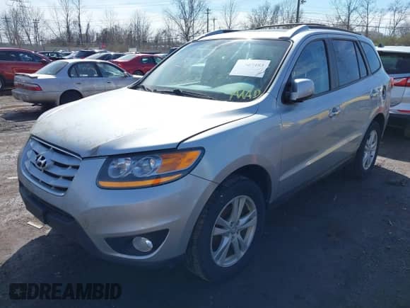 2010 Hyundai Santa Fe Limited with VIN 5NMSK4AG8AH380714, listed as a IAAI auction lot 41865483 with 169,554 mi miles and . Bid and sale history available at DreamBid. Image 2.