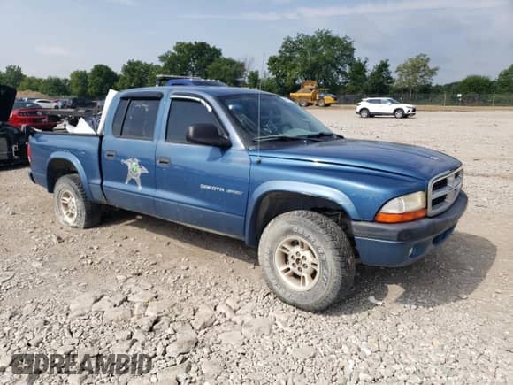 2002 Dodge Dakota Sport z VIN 1B7HG38N42S705813, wystawiony jako Copart lot #66498235 z przebiegiem Nie podano mil oraz Czysty tytuł • Clean title. Historia ofert i sprzedaży dostępna na DreamBid. Obrazek 4.