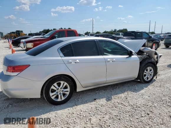 2010 Honda Accord LX-P with VIN 1HGCP2F49AA165590, listed as a Copart auction lot 71535705 with 127,501 mi miles and Salvage title. Bid and sale history available at DreamBid. Image 3.