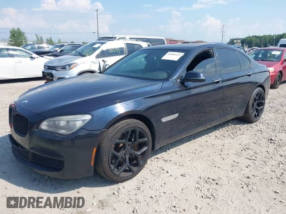 2013 BMW 7 Series 750i xDrive with VIN WBAYB6C52DD224034, listed as a IAAI auction lot 42908453 with 161,995 mi miles and . Bid and sale history available at DreamBid. Image 17.