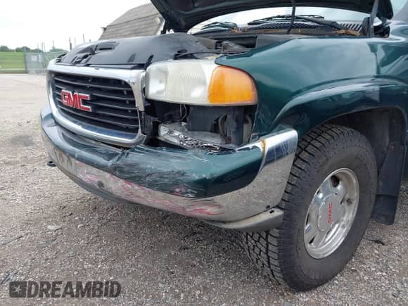 2002 GMC Sierra 1500 SLE z VIN 2GTEK19T621256296, wystawiony jako IAAI lot #42879825 z przebiegiem 164 549 mil mil oraz . Historia ofert i sprzedaży dostępna na DreamBid. Obrazek 6.