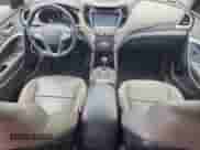 2015 Hyundai Santa Fe z VIN 5XYZUDLB1FG294690, wystawiony jako Copart lot #65039015 z przebiegiem 144 835 mil mil oraz Szkoda całkowita • Salvage title. Historia ofert i sprzedaży dostępna na DreamBid. Obrazek 8.