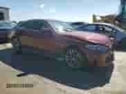 2022 BMW 4 Series 430i with VIN WBA63AV01NFL94979, listed as a Copart auction lot 50218815 with Not provided miles and Salvage title. Bid and sale history available at DreamBid. Image 4.