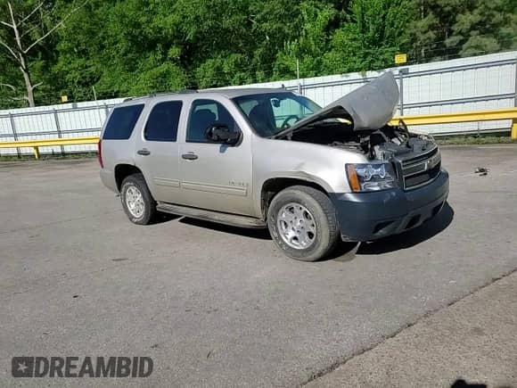 2009 Chevrolet Tahoe LS z VIN 1GNFC13C09R276501, wystawiony jako Copart lot #51229125 z przebiegiem 243 198 mil mil oraz Szkoda całkowita • Salvage title. Historia ofert i sprzedaży dostępna na DreamBid. Obrazek 11.