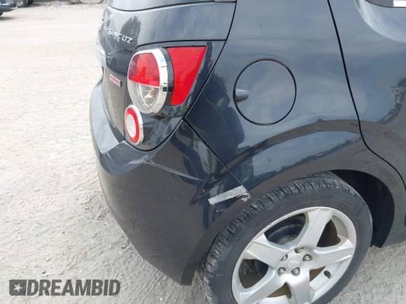 2015 Chevrolet Sonic LTZ with VIN 1G1JE6SB5F4187091, listed as a IAAI auction lot 43239971 with 123,749 mi miles and . Bid and sale history available at DreamBid. Image 6.
