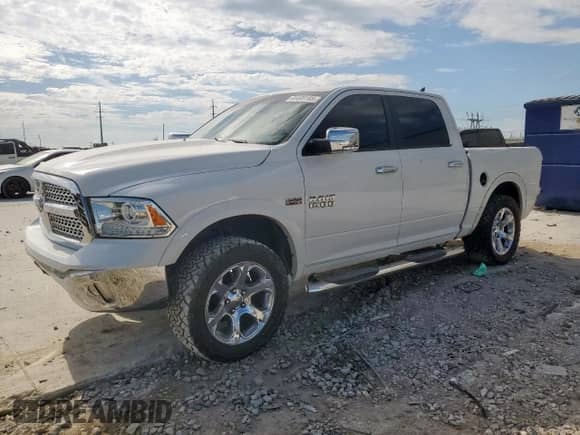 2017 Ram 1500 Laramie with VIN 1C6RR7NT0HS740888, listed as a Copart auction lot 65405185 with 119,104 mi miles and Salvage title. Bid and sale history available at DreamBid. Image 1.