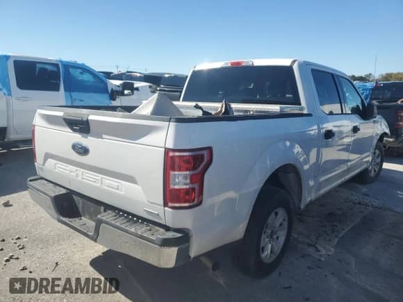 2018 Ford F-150 XL z VIN 1FTEW1CG8JFB30559, wystawiony jako Copart lot #61443065 z przebiegiem 186 737 mil mil oraz Szkoda całkowita • Salvage title. Historia ofert i sprzedaży dostępna na DreamBid. Obrazek 3.