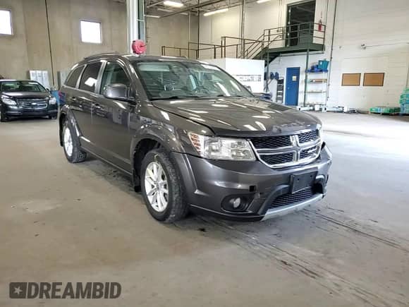 2015 Dodge Journey SXT with VIN 3C4PDDBG6FT601333, listed as a Copart auction lot 66755995 with 114,587 mi miles and Salvage title. Bid and sale history available at DreamBid. Image 14.