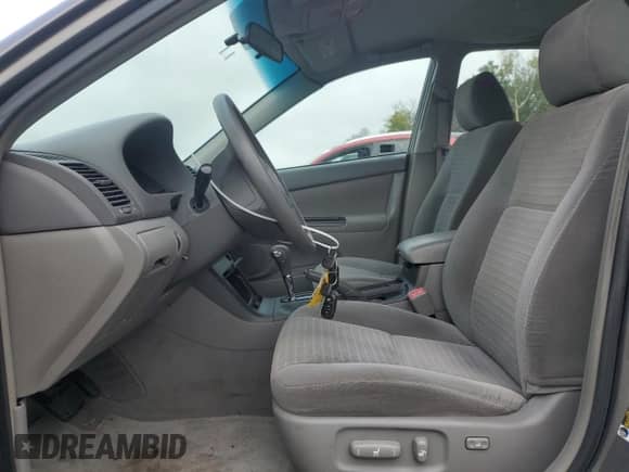 2006 Toyota Camry LE with VIN 4T1BE32K86U651321, listed as a Copart auction lot 86110585 with 77,256 mi miles and Salvage title. Bid and sale history available at DreamBid. Image 7.