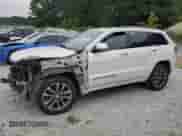 2017 Jeep Grand Cherokee Overland with VIN 1C4RJECG1HC773855, listed as a Copart auction lot 70180755 with 123,525 mi miles and Salvage title. Bid and sale history available at DreamBid. Image 1.