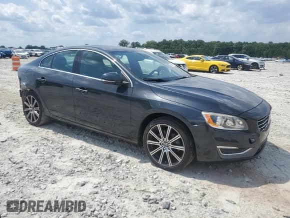 2015 Volvo S60 T6 Drive-E with VIN YV149MFK3F1349819, listed as a Copart auction lot 66590114 with 166,860 mi miles and Salvage title. Bid and sale history available at DreamBid. Image 4.