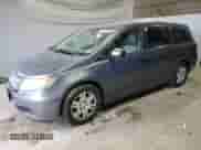 2013 Honda Odyssey LX с VIN 5FNRL5H28DB065347, выставлен на аукционе Copart как лот 71163895 с пробегом 149 224 миль миль и Списание • Salvage title. История ставок и продаж доступна на DreamBid. Изображение 1.