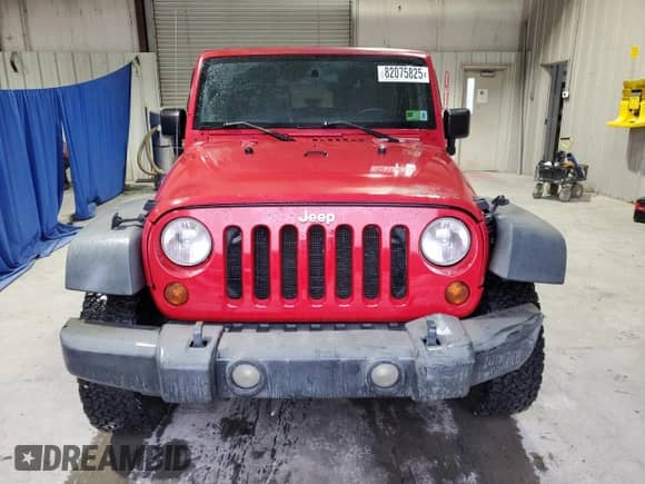 2009 Jeep Wrangler X с VIN 1J4FA24109L733404, выставлен на аукционе Copart как лот 82075825 с пробегом 149 544 миль миль и Списание • Salvage title. История ставок и продаж доступна на DreamBid. Изображение 5.