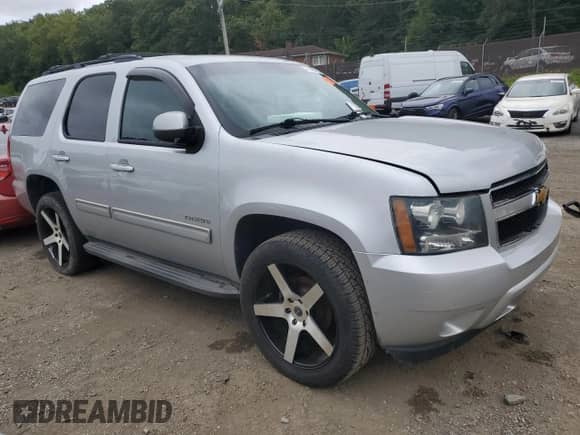 2012 Chevrolet Tahoe LS with VIN 1GNSKAE00CR212390, listed as a Copart auction lot 71676775 with Not provided miles and Salvage title. Bid and sale history available at DreamBid. Image 4.