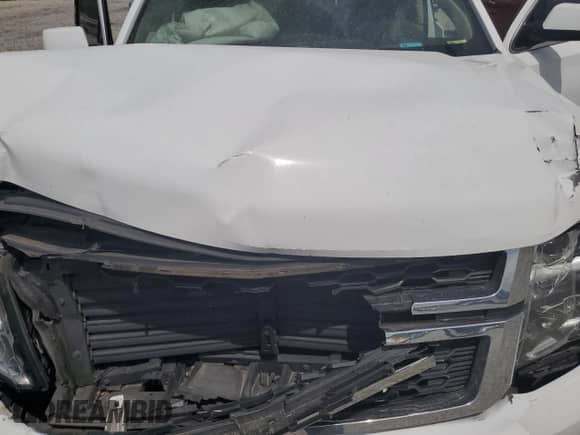 2020 Chevrolet Suburban LT z VIN 1GNSCHKC3LR167806, wystawiony jako Copart lot #59787085 z przebiegiem Nie podano mil oraz Szkoda całkowita • Salvage title. Historia ofert i sprzedaży dostępna na DreamBid. Obrazek 12.