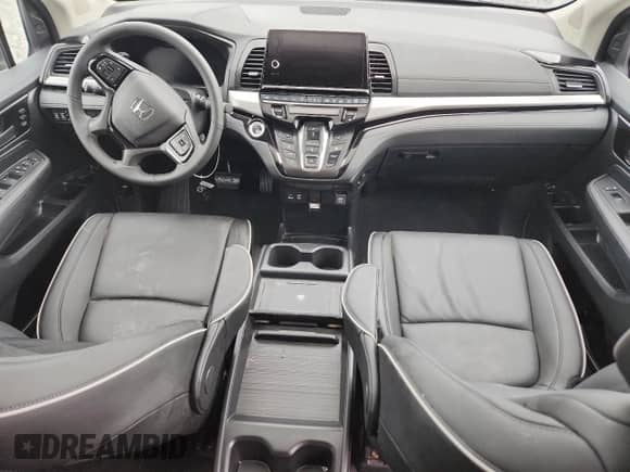 2025 Honda Odyssey Touring с VIN 5FNRL6H87SB074287, выставлен на аукционе Copart как лот 65152345 с пробегом Не указан миль и Списание • Salvage title. История ставок и продаж доступна на DreamBid. Изображение 8.