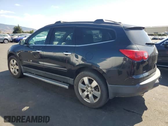 2012 Chevrolet Traverse LTZ with VIN 1GNKVLED1CJ213956, listed as a Copart auction lot 85748665 with 138,714 mi miles and Salvage title. Bid and sale history available at DreamBid. Image 2.